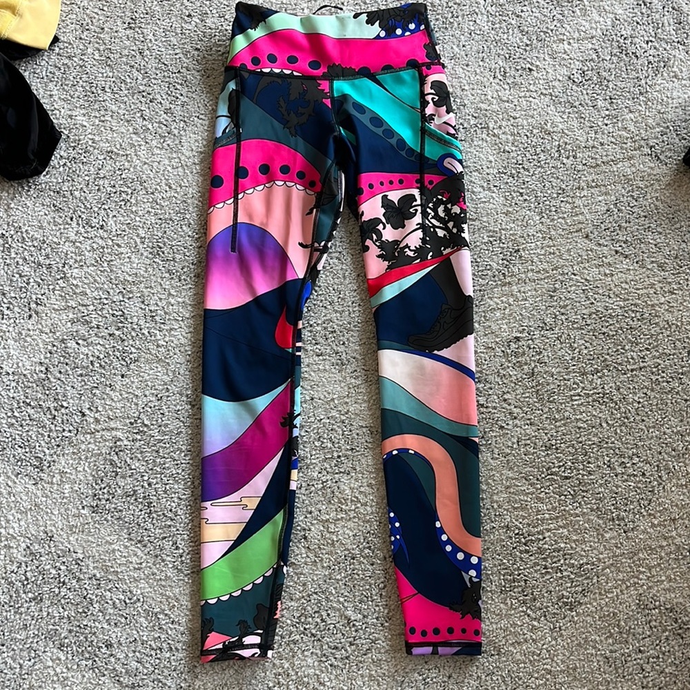 Pockets on both legs a zipper on the back and pocket in front